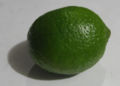 A closeup of a whole lime